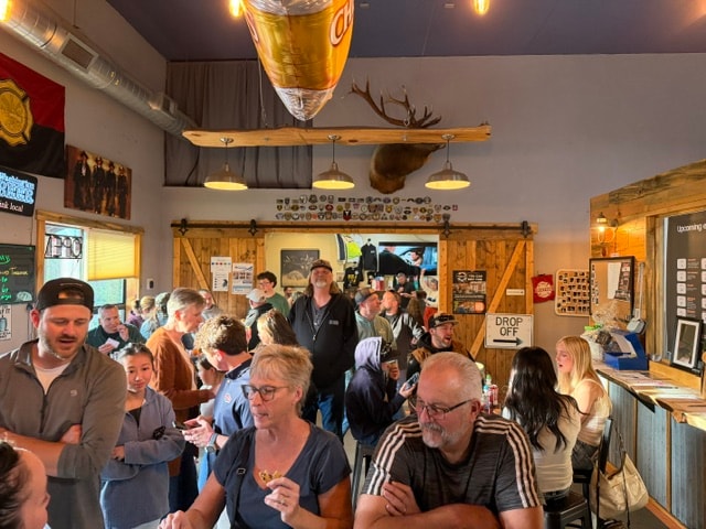 Packed taproom crowd at Mule & Elk
